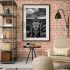 khoisan woman black and white stormy portrait living room with brick wall